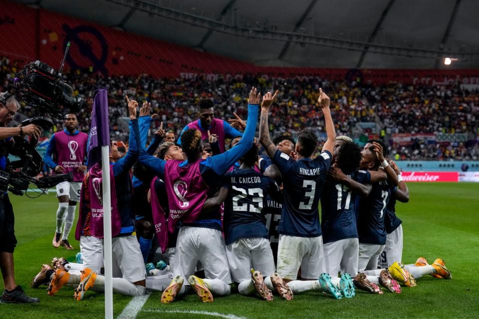 Ecuador’s Enner Valencia celebrates with his teammates after scoring (AP)