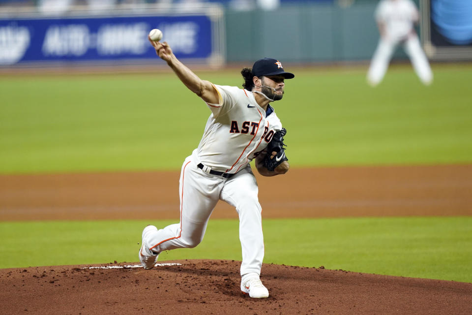 Houston Astros starting pitcher Lance McCullers Jr. throws against the San Francisco Giants during the first inning of a baseball game Monday, Aug. 10, 2020, in Houston. (AP Photo/David J. Phillip)