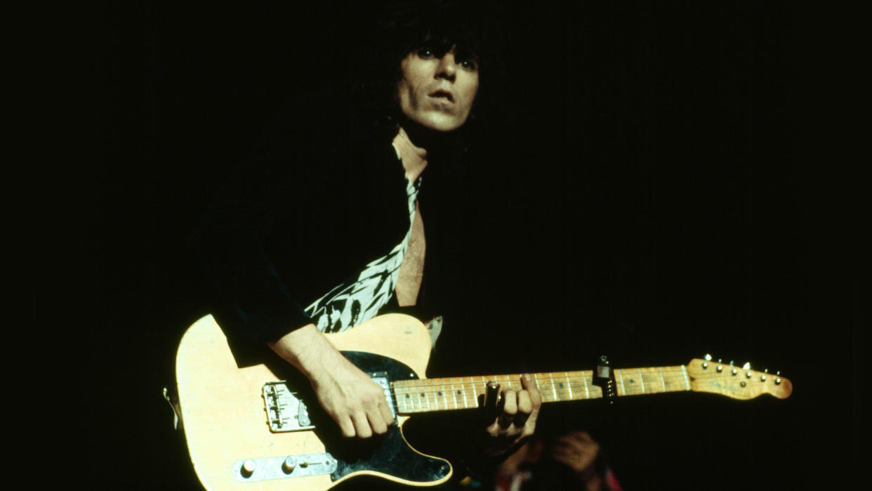  Photo of ROLLING STONES and Keith RICHARDS, Keith Richards performing on stage, playing Fender Telecaster . 