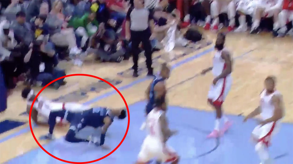 Memphis Grizzlies rookie Ja Morant, pictured bottom left, escaped injury after this awkward fall.