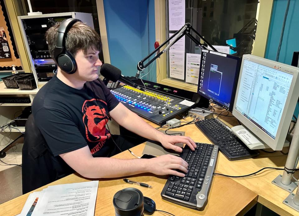 Bryan Wilson, a student volunteer and radio host at the University of Windsor's CJAM 99.1 FM, gets ready for broadcast of his show, Indie Electric.