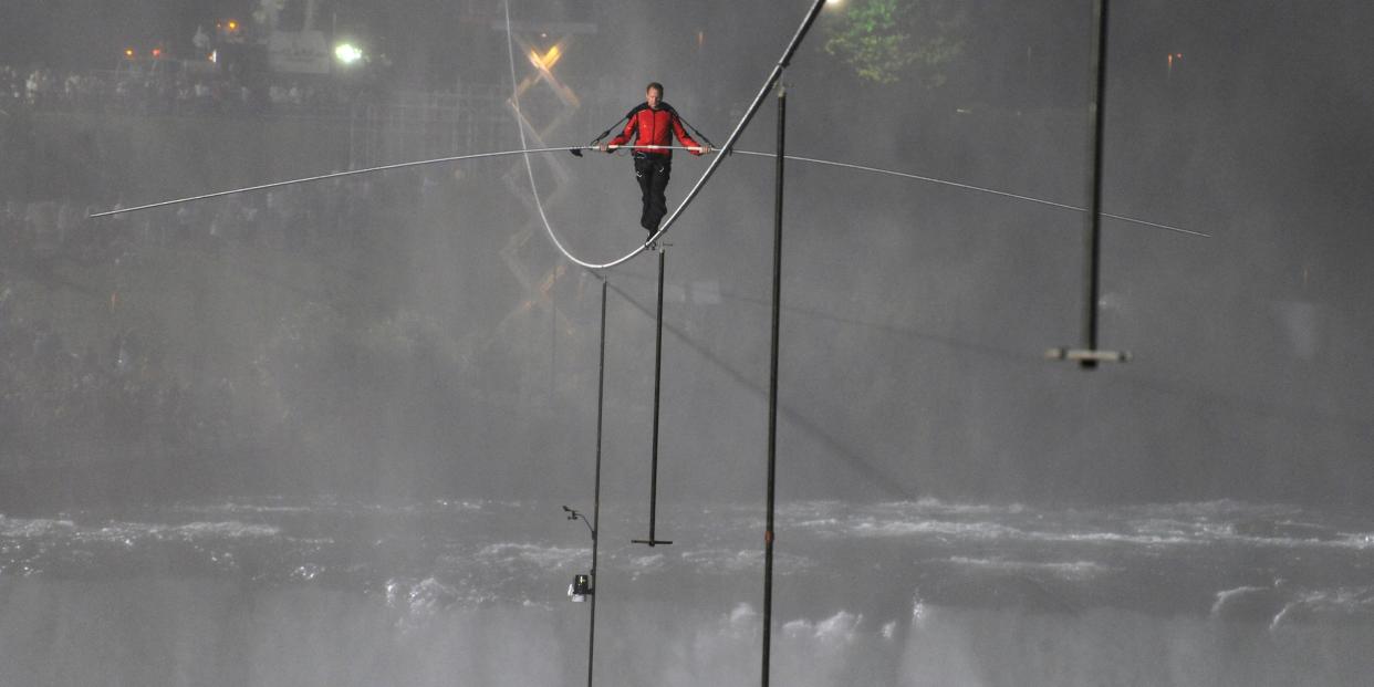 Daredevil Nik Wallenda walks across Niagara Falls from the US to the Canadian border on a tightrope in 2012.