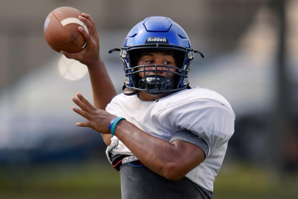 Quarterback Colin Hurley targets a receiver during Trinity Christian's practice at the school's Hammond Blvd. campus Tuesday, August 16, 2022.