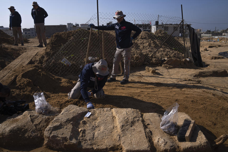 A Palestinian excavation team works in a newly discovered Roman era cemetery in the Gaza Strip, Sunday, Dec. 11, 2022. Hamas authorities in Gaza announced the discovery of over 60 tombs in the ancient burial site. Work crews have been excavating the site since it was discovered last January during preparations for an Egyptian-funded housing project. (AP Photo/Fatima Shbair)