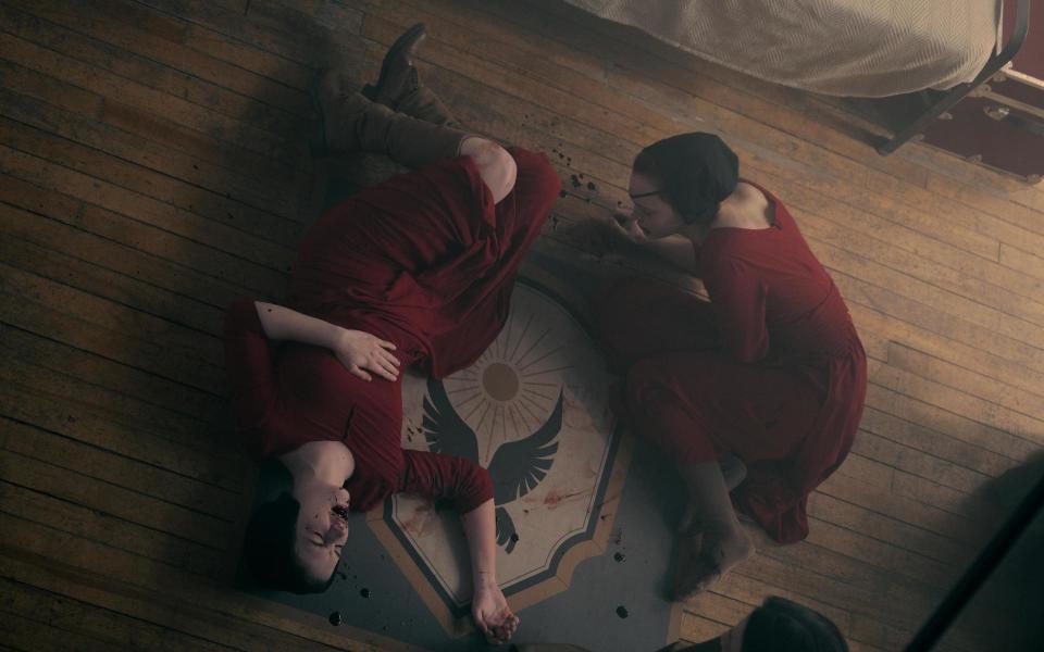 Madeline Brewer and McKenna Grace in “The Handmaid’s Tale” - Credit: Sophie Giraud/Hulu