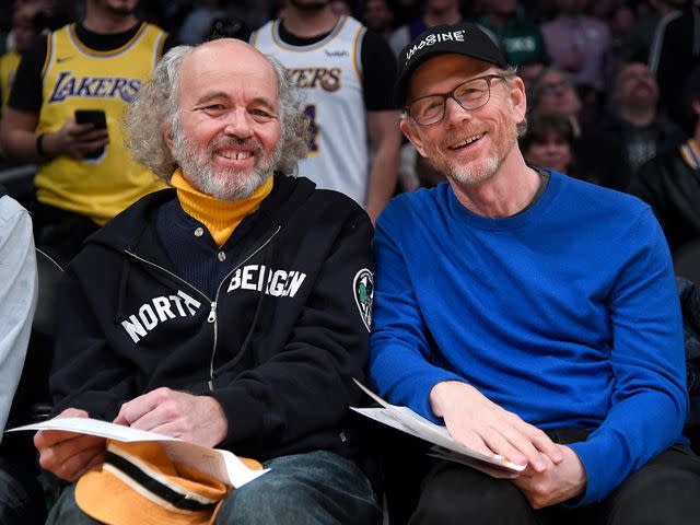 <p>Kevork S. Djansezian/Getty</p> Clint Howard (left) and Ron Howard