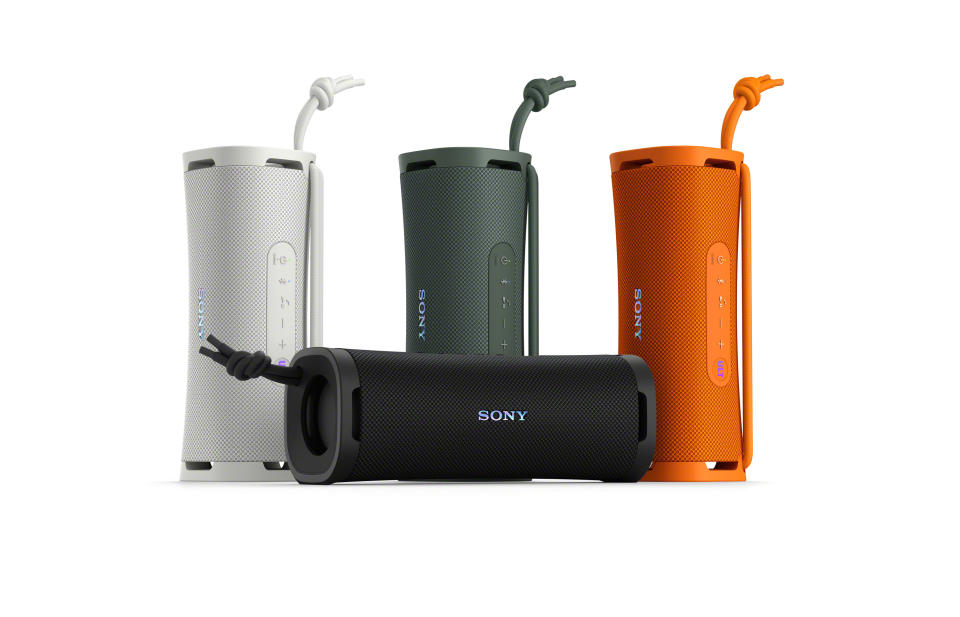 Sony Ult Field 1 in off-whit, black, forest gray, and orange.