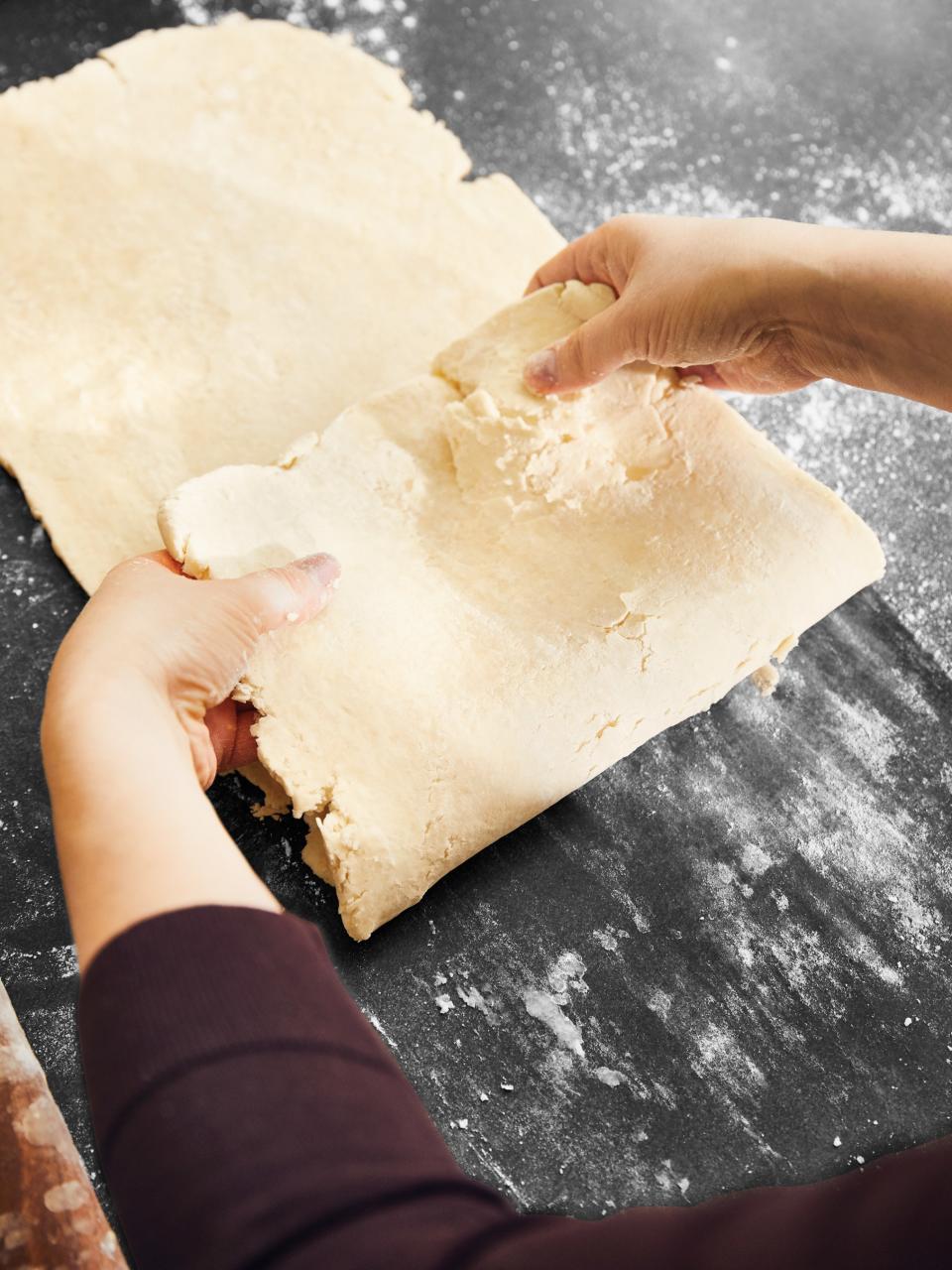 To create layers and layers of flaky pastry, fold the dough into thirds like a letter then roll out into a smooth sheet with a rolling pin.