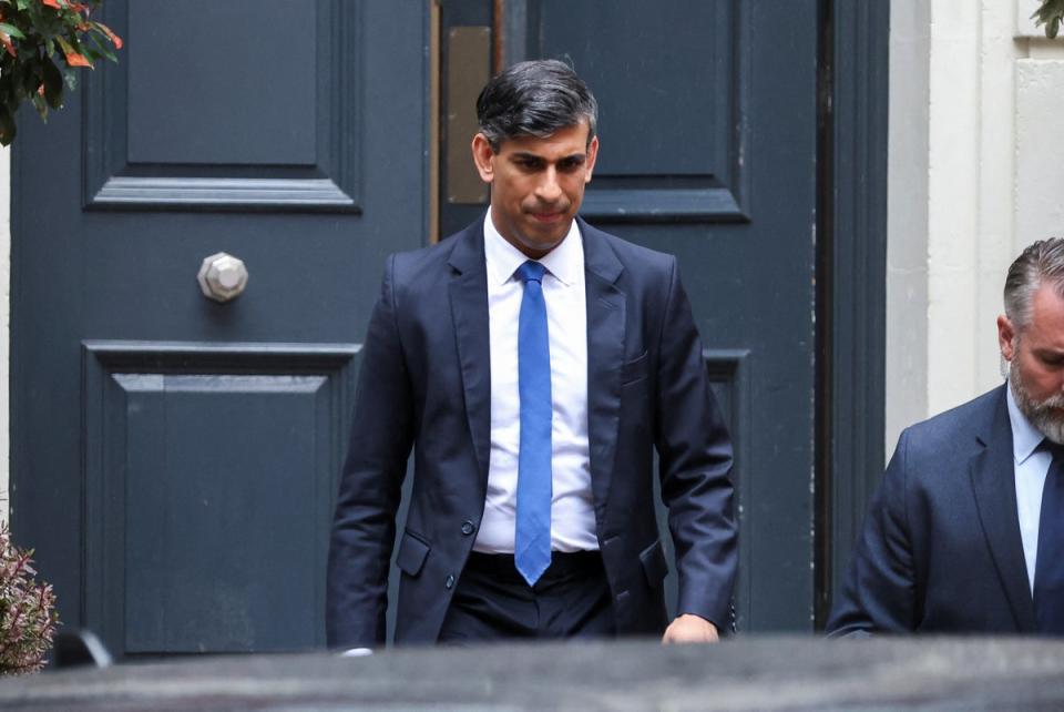 <p>Outgoing British Prime Minister Rishi Sunak walks outside Conservative Campaign Headquarters, following the results of the general election</p> (REUTERS)