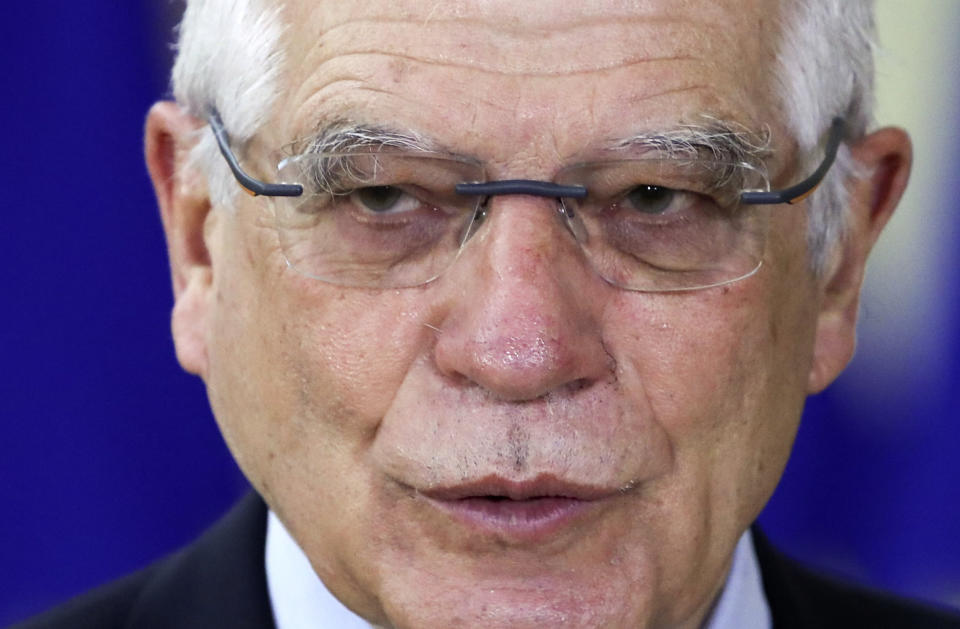 European Union foreign policy chief Josep Borrell speaks to the media as he arrives for a meeting of EU foreign ministers at the European Council building in Brussels, Monday, Feb 22, 2021. European Union foreign ministers on Monday will look at options for imposing fresh sanctions against Russia over the jailing of opposition leader Alexei Navalny as the 27-nation bloc considers the future of its troubled ties with the country. (Yves Herman, Pool via AP)