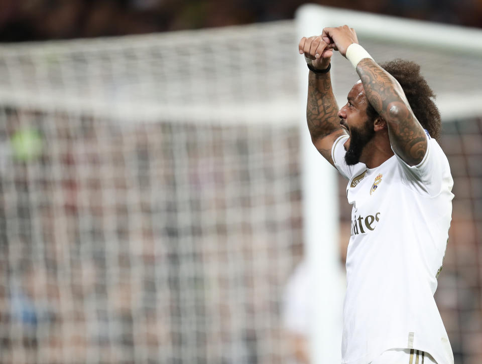 Marcelo of Real Madrid celebrates during the Champions League match between Real Madrid and Paris at Estadio Santiago Bernabeu on November 26, 2019 in Madrid, Spain.  (Photo by Raddad Jebarah/NurPhoto via Getty Images)