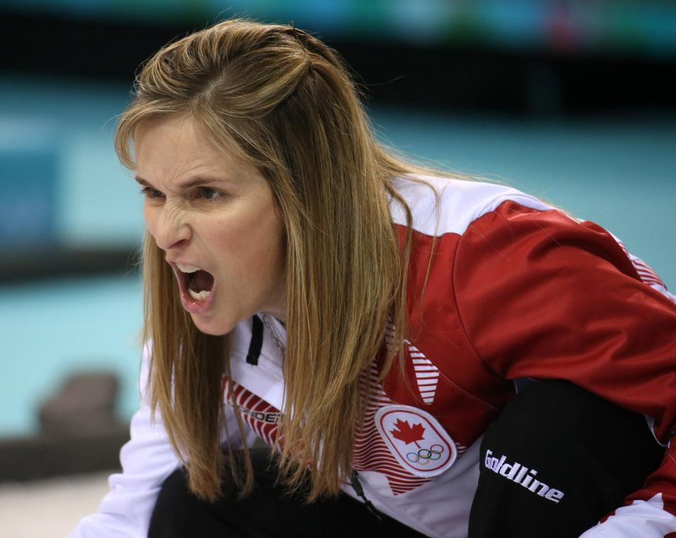 Canada's skip Jennifer Jones yells instructions during her team's victory over Great Britain in the women's curling semifinals, at the Ice Cube Curling Center during the Winter Olympics in Sochi, Russia, Wednesday, Feb. 19, 2014.