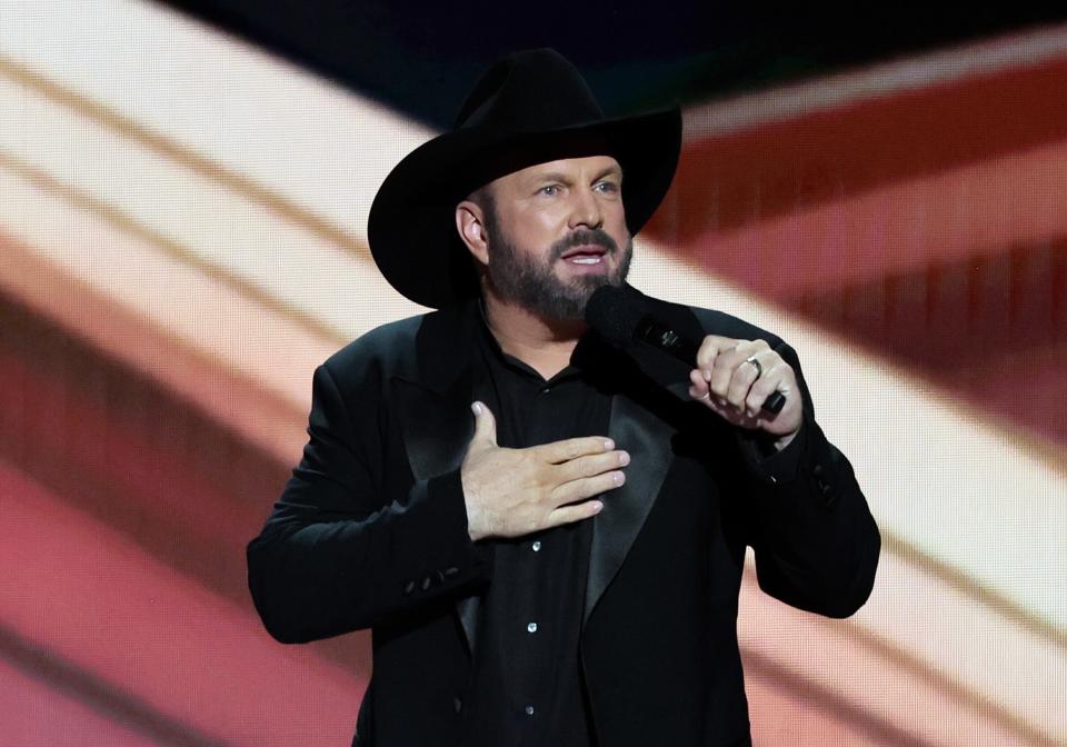 Garth Brooks speaks onstage during the 58th Academy Of Country Music Awards.