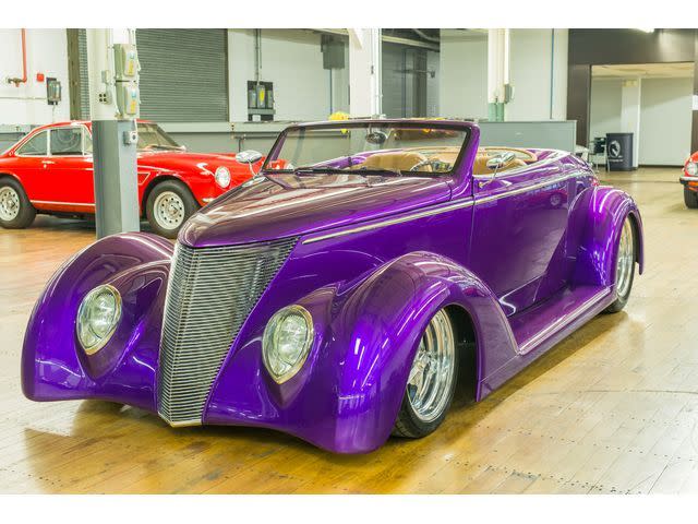 <img src="1937-ford.jpg" alt="A custom 1937 Ford Roadster">