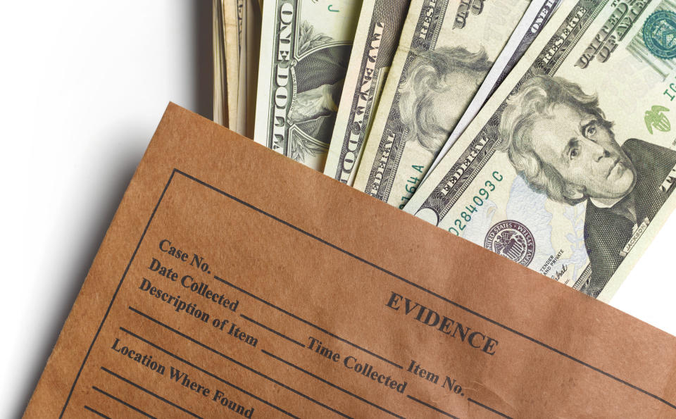 Evidence envelope with US dollar bills