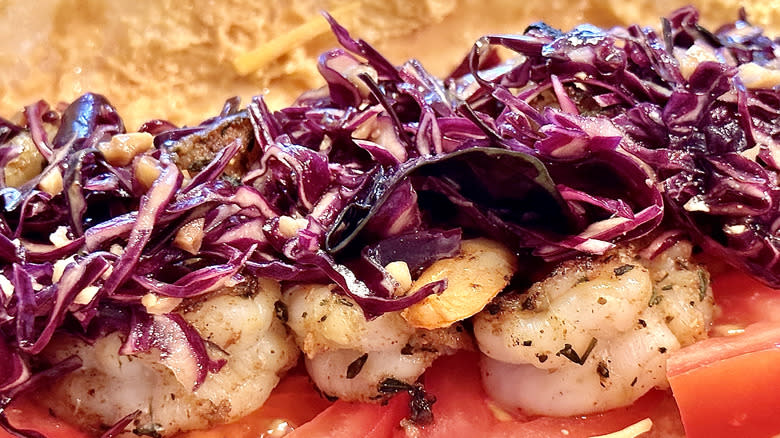 Shrimp and red cabbage slaw with tomatoes