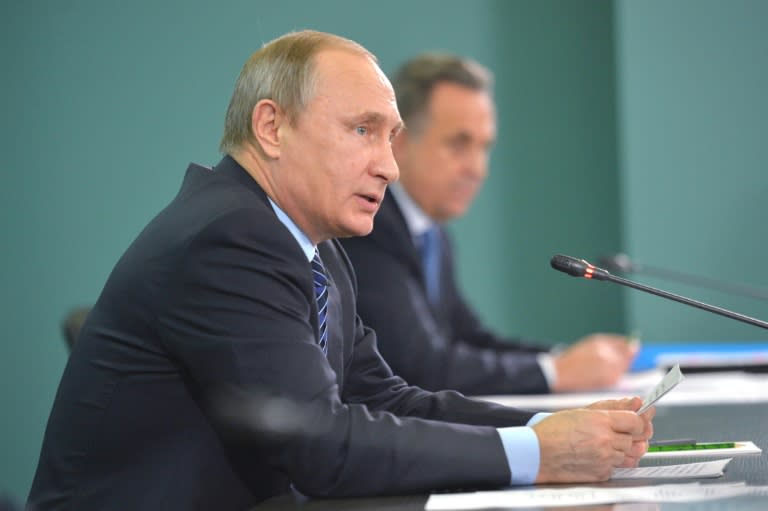 Russian President Vladimir Putin speaks during a meeting with heads of Russian sports federations in Sochi on November 11, 2015