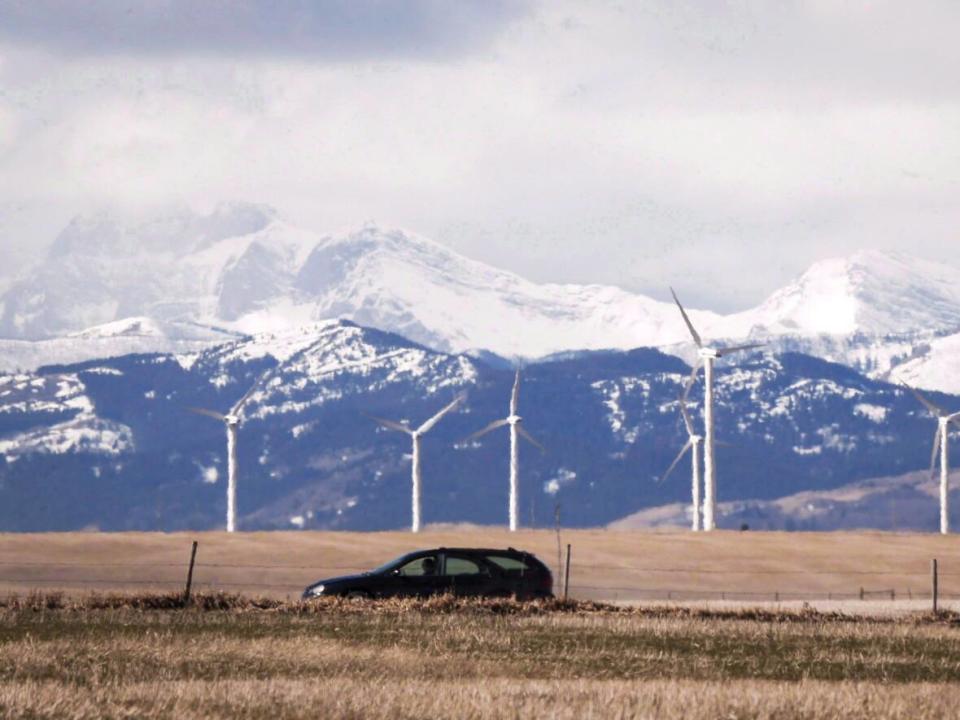 The Alberta government intends to block new renewable power projects within 35 kilometres of parks, protected areas and designated 'viewscapes,' potentially making this TransAlta/Rockies vista one of the last of its kind. (Jeff McIntosh/The Canadian Press - image credit)