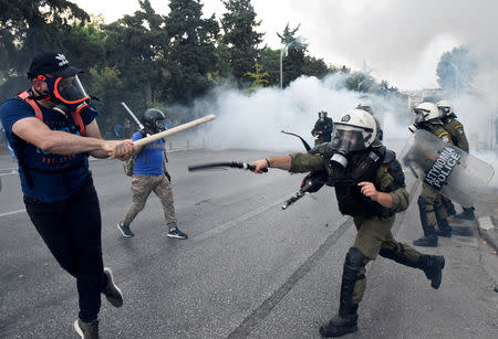 Protesters clash with police during a demonstration against the agreement reached by Greece and Macedonia to resolve a dispute over the former Yugoslav republic's name, during the opening of the annual International Trade Fair of Thessaloniki by Greek Prime Minister Alexis Tsipras in Thessaloniki, Greece, September 8, 2018. REUTERS/Alexandros Avramidis