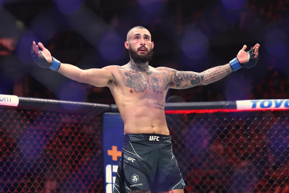 May 6, 2023; Newark, New Jersey, USA; Charles Jourdain (blue gloves)reacts after defeating Kron Gracie (red gloves) during UFC 288 at Prudential Center. Mandatory Credit: Ed Mulholland-USA TODAY Sports