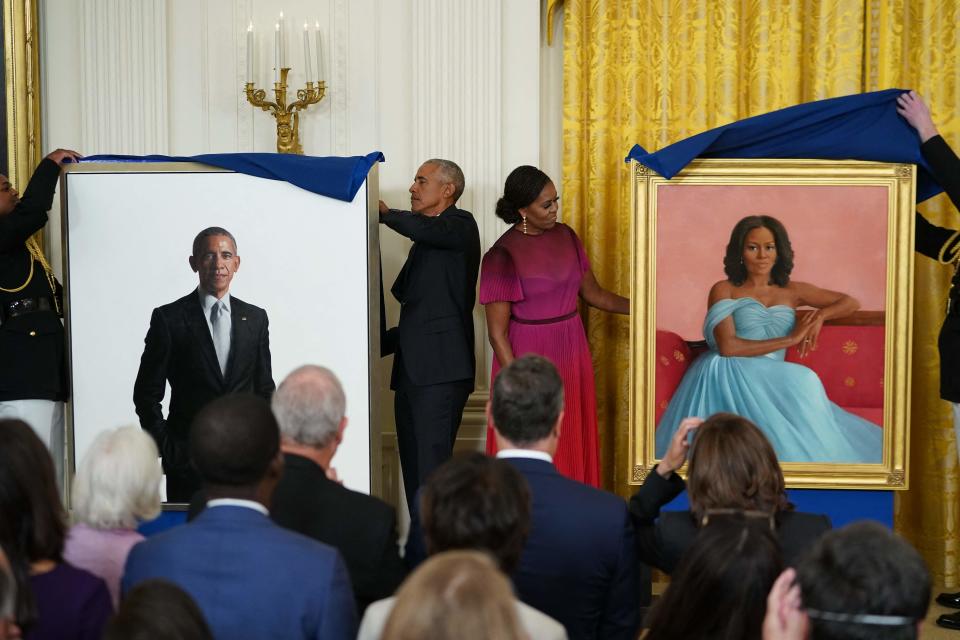 Former US President Barack Obama and First Lady Michelle Obama unveil their official White House portraits, in the East Room of the White House in Washington, DC, on September 7, 2022.