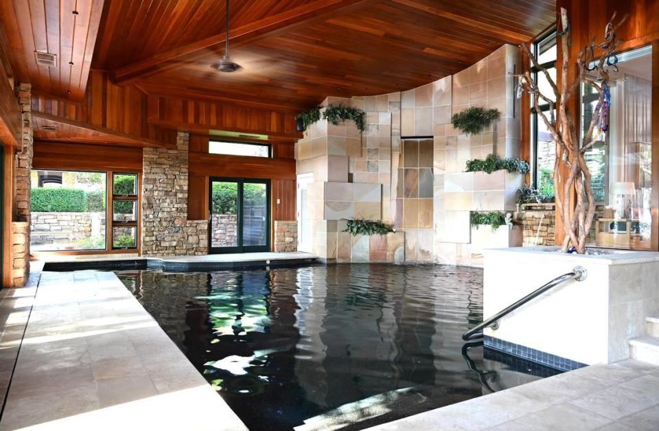 The indoor pool at Charlotte area’s priciest mansion. The $22M home hit the market this week, one perched on its own Lake Norman Island.