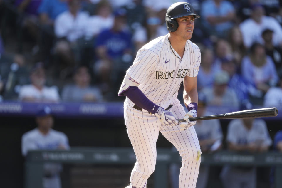 Colorado Rockies' Nolan Jones heads up the first-base line after hitting a solo home run against Los Angeles Dodgers relief pitcher Ryan Pepiot in the seventh inning of the first game of a baseball doubleheader on Tuesday, Sept. 26, 2023, in Denver. (AP Photo/David Zalubowski)