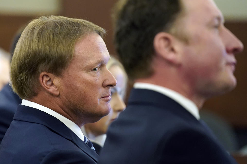 FILE - Jon Gruden listens in court Wednesday, May 25, 2022, in Las Vegas, where a judge heard a bid by the National Football League to dismiss former Las Vegas Raiders coach Jon Gruden's lawsuit, accusing the league of a "malicious and orchestrated campaign" including the leaking of offensive emails ahead of his resignation last October. In a Monday July 1, 2024, posting, Gruden lost a bid for the Nevada Supreme Court to reconsider whether a contract interference and conspiracy lawsuit he filed against the league after he resigned from the Las Vegas Raiders in 2021 should be heard in courts or in private arbitration. (AP Photo/John Locher, File)