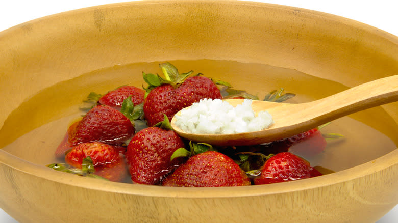 Strawberries in water with salt