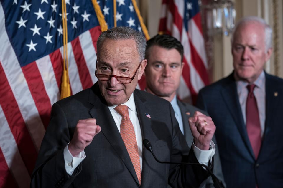 From left, Senate Majority Leader Chuck Schumer, D-N.Y., Sen. Todd Young, R-Ind., and Sen. John Cornyn, R-Texas, talk about the bipartisan effort to pass a bill designed to encourage more semiconductor companies to build chip plants in the United States, at the Capitol in Washington on July 27, 2022. The $280 billion measure, which awaits a House vote, includes federal grants and tax breaks for companies that construct their chip facilities in the U.S.