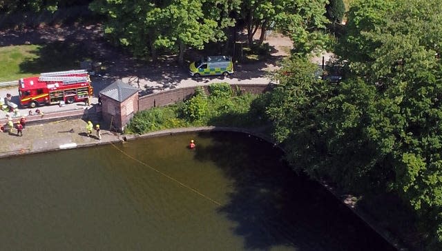 Emergency services at the scene at Carr Mill Dam