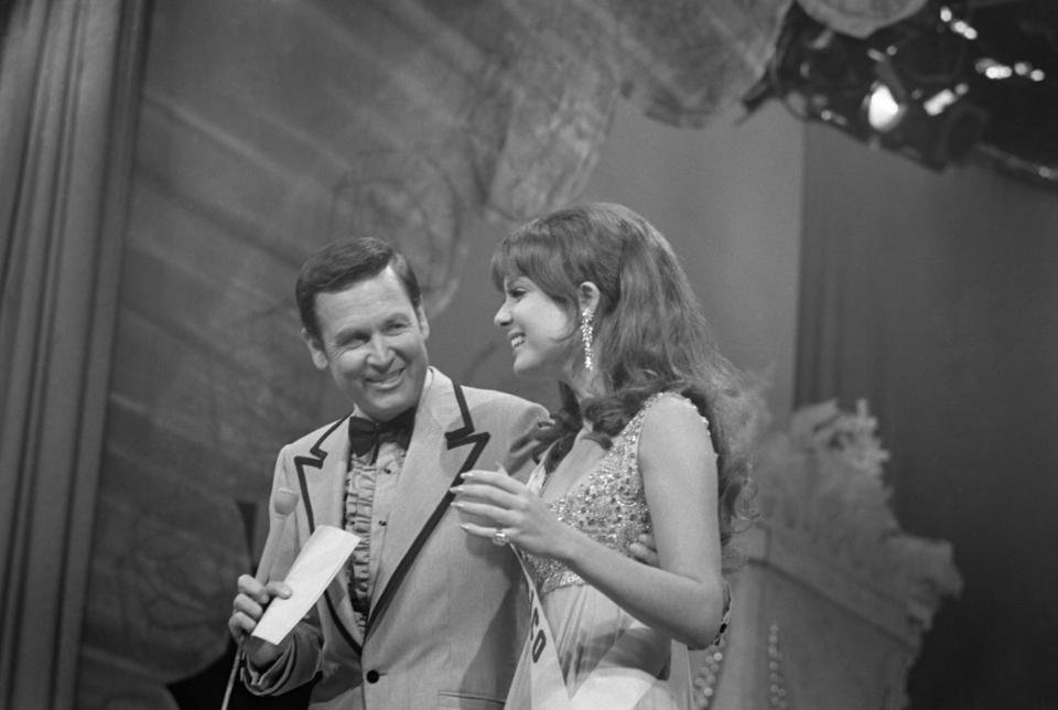 Miss Universe pageant host Bob Barker, left, who was master of ceremonies from 1967 to 1987, with Miss Puerto Rico Marisol Malaret Contreras in 1970 in Miami Beach (Photo: Getty Images)