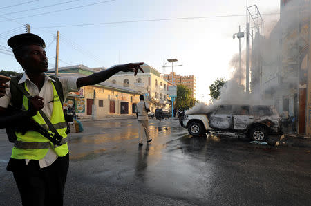 A policeman is seen at the scene of an explosion in Mogadishu, Somalia September 22, 2018. REUTERS/Feisal Omar