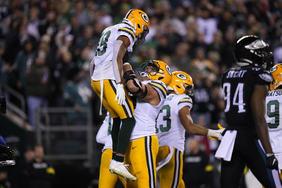 Green Bay Packers wide receiver Randall Cobb (18) celebrates a touchdown with David Bakhtiari during the first half of an NFL football game against the Philadelphia Eagles, Sunday, Nov. 27, 2022, in Philadelphia. (AP Photo/Matt Slocum)