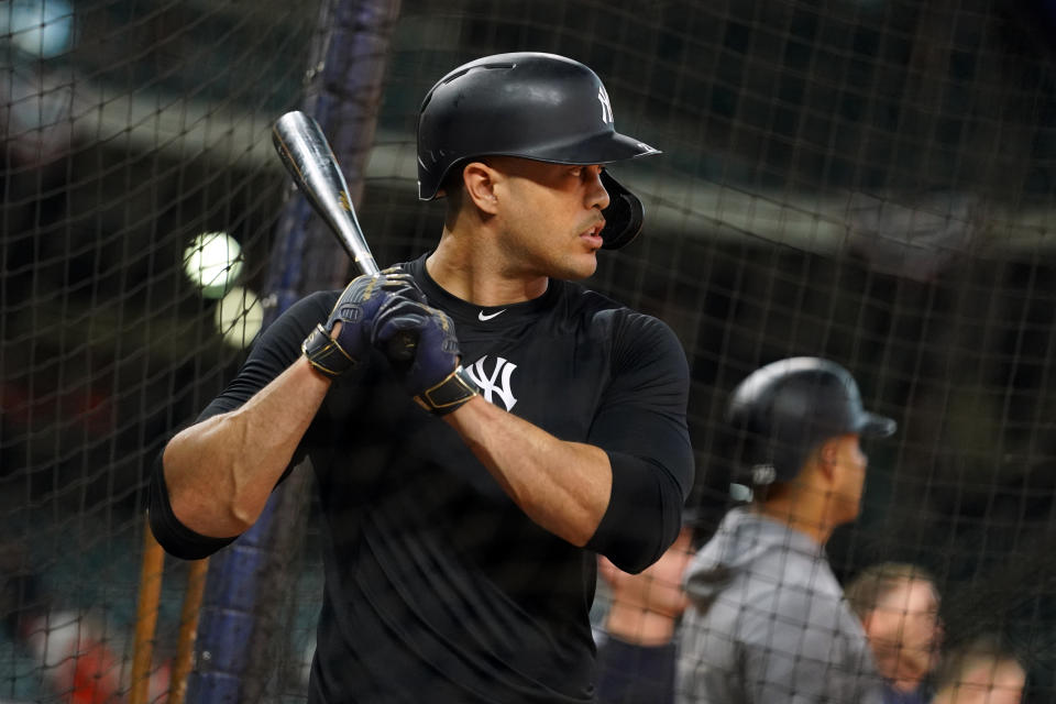 HOUSTON, TX - OCTOBER 12:  Giancarlo Stanton #27 of the New York Yankees takes batting practice prior to Game 1 of the ALCS between the New York Yankees and the Houston Astros at Minute Maid Park on Saturday, October 12, 2019 in Houston, Texas. (Photo by Cooper Neill/MLB Photos via Getty Images)