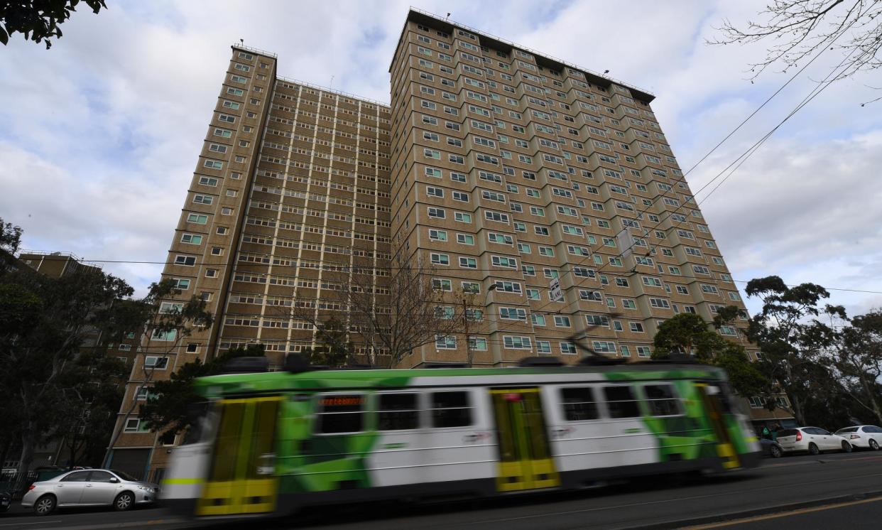 <span>A public housing tower in Carlton, among those scheduled for demolition.</span><span>Photograph: James Ross/AAP</span>