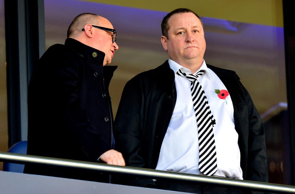Newcastle United's Mike Ashley, right, is one of the least popular owners in the Premier League, but that could soon be eclipsed by the Saudi takeover of the club. (Photo by Paul Ellis/AFP via Getty Images)