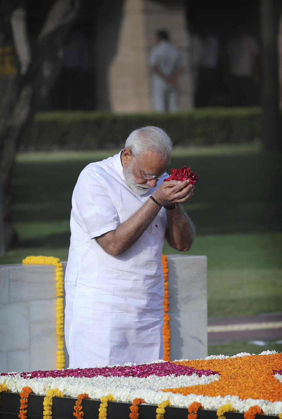 Indian Prime Minister Narendra Modi pays tribute at Rajghat, the memorial to Mahatma Gandhi, before being sworn in for his second term as Indian prime minister this evening in New Delhi, India, Thursday, May 30, 2019. India's president on Saturday appointed Modi as the prime minister soon after newly-elected lawmakers from the ruling alliance, led by the Hindu nationalist Bharatiya Janata Party, elected him as their leader after a thunderous victory in national elections. (AP Photo/Manish Swarup)