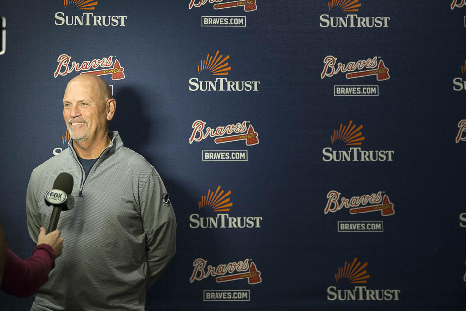 Atlanta Braves manager Brian Snitker speaks with media following a news conference for newly signed player Brian McCann at the Delta360 Club at SunTrust Park in Atlanta Monday, November 26, 2018. McCann signed to a one-year contract with the Atlanta Braves for $2 million. (Alyssa Pointer/Atlanta Journal-Constitution via AP)