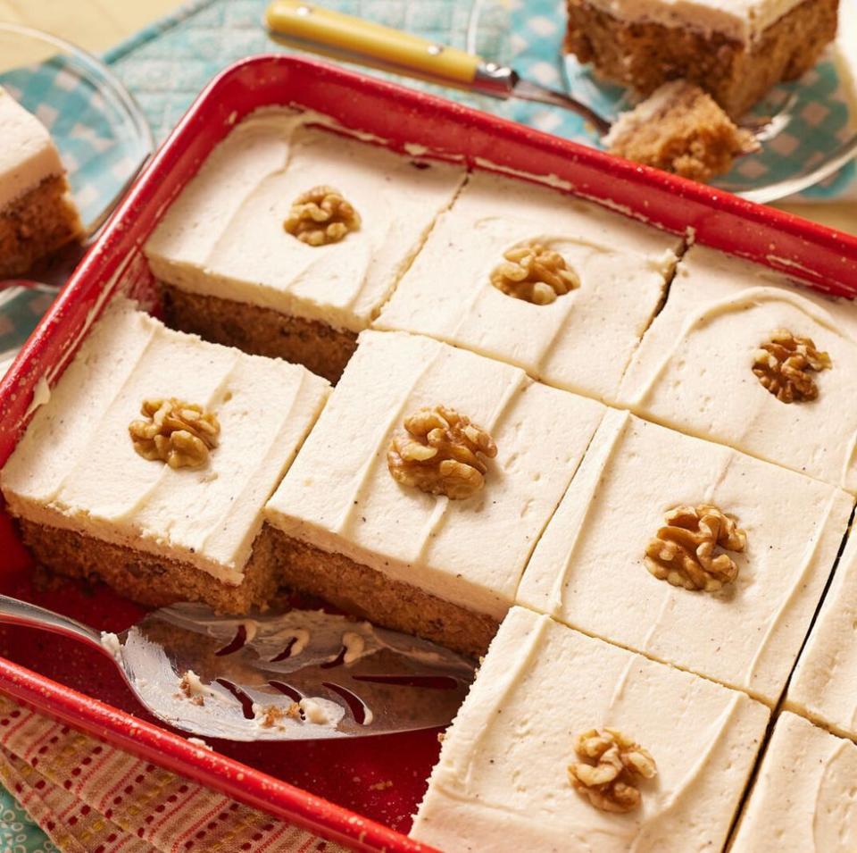 applesauce cake with walnuts in red baking dish