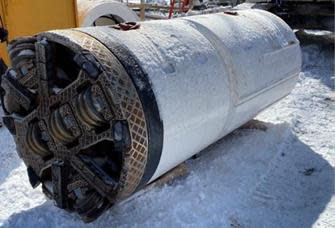 The trapped boring machine is 1.5 metres in diameter and five metres in length. City contractors will attempt to remove it in pieces from the tunnel below Old Mill Drive in the coming weeks. 