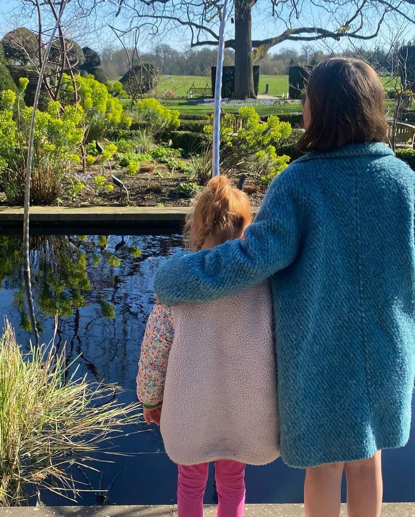 Helen's daughters cuddled in her sweet photo