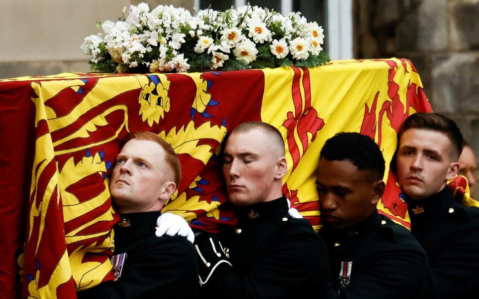 Military bearers from the Royal Regiment of Scotland carry the late Queen’s coffin into the Throne Room at the Palace of Holyroodhouse - Alkis Konstantinidis/Reuters/Alkis Konstantinidis/Reuters