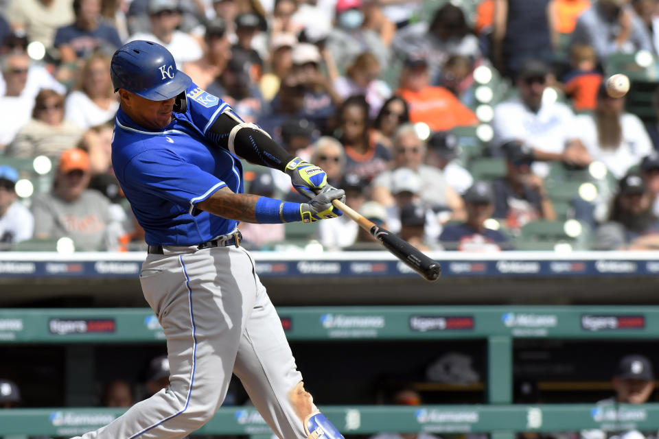 Kansas City Royals designated hitter Salvador Perez flies out to center field against the Detroit Tigers in the fourth inning of a baseball game, Sunday, Sept. 26, 2021, in Detroit. (AP Photo/Jose Juarez)