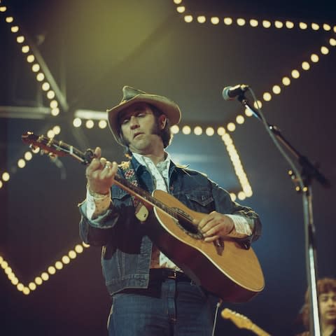 Don Williams performs on stage at the Country Music Festival held at Wembley Arena, London in April 1977 - Credit: David Redfern