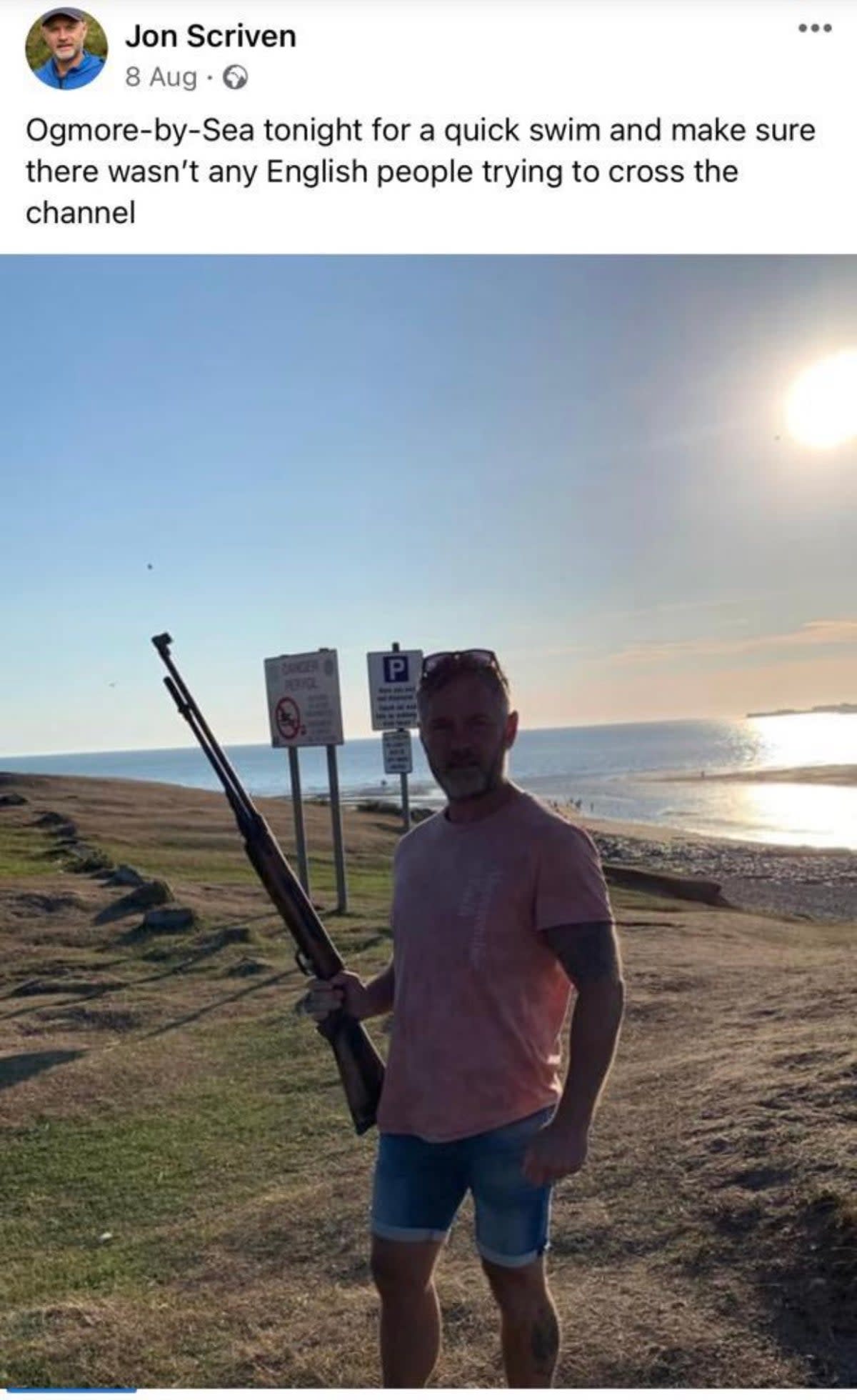 Councillor Jon Scriven appearing to hold a firearm in what has been claimed to be a ‘xenophobic’ Facebook post (Jon Scriven/Facebook/PA)