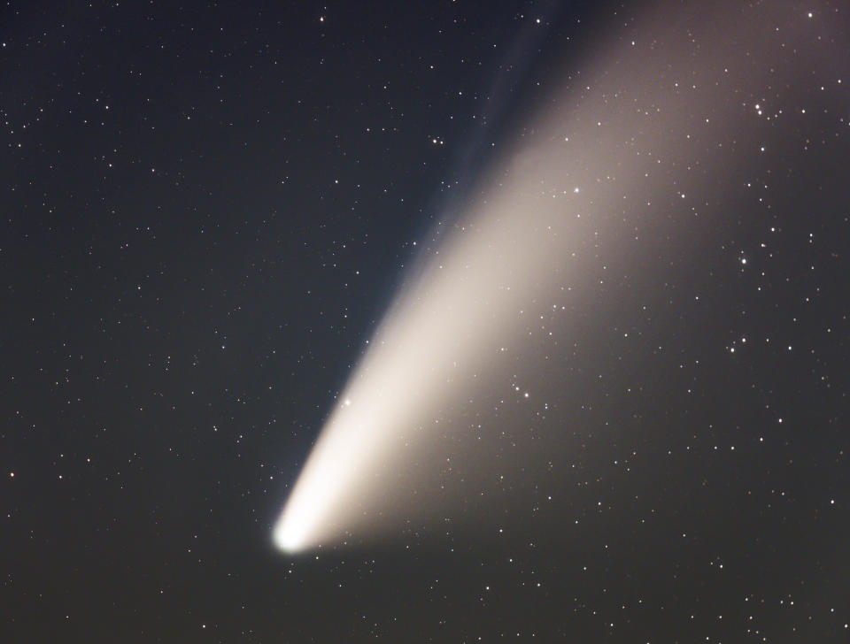 This photograph provided to The Associated Press by Johnny Horne shows Comet NEOWISE as photographed using a telescope from Grandfather Mountain Saturday, July 18, 2020 in Linville, N.C. (Johnny Horne, via AP)