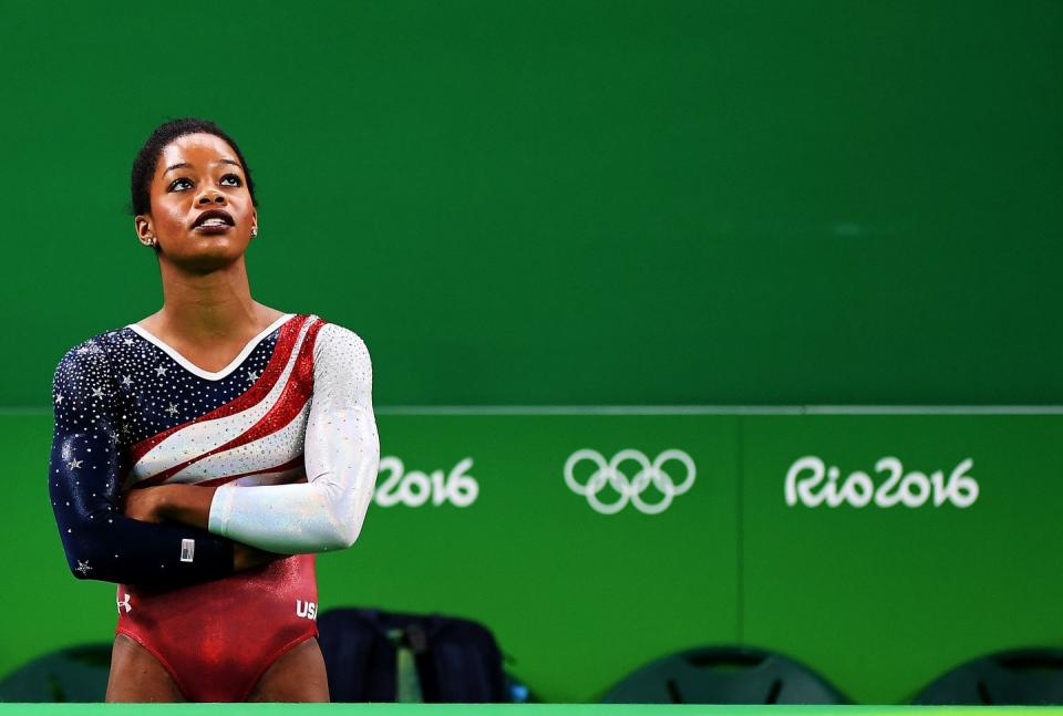 <p>American artistic gymnast Douglas is the first African American to take the Olympic individual all-around champion title, winning the accolade at London 2012. Originally from Virgina, the young athlete has three Olympic and two World Championship gold medals to her name, as well as one silver World Championship medal. </p>