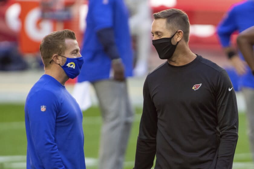 Los Angeles Rams head coach Sean McVay and Arizona Cardinals head coach Kliff Kingsbury talk prior to an NFL football game, Sunday, Dec. 6, 2020, in Glendale, Ariz. (AP Photo/Jennifer Stewart)