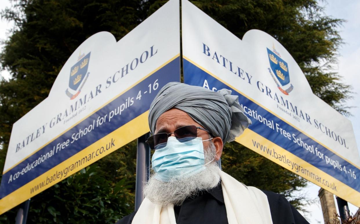 Protesters gathered outside Batley Grammar School in Batley, West Yorkshire, where a teacher has been suspended for reportedly showing a caricature of the Prophet Mohammed to pupils during a religious studies lesson - Danny Lawson/PA